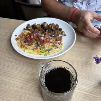 Juno's - omelette with roasted potatoe side - Wine Bars Near Me - San Diego, California