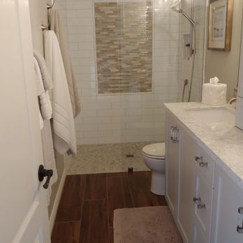 Nola Construction & Design - Upstairs hallway bathroom. Removed bathtub shower combo and now a beautiful walk-in shower and completely redone bathroom that is gorgeous. - General Contractors Near Me Nola Construction & Design - Upstairs hallway bathroom. Removed bathtub shower combo and now a beautiful walk-in shower and completely redone bathroom that is gorgeous. - General Contractors Near Me