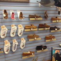 Fort Fudge Shop - Wall of moccasins.