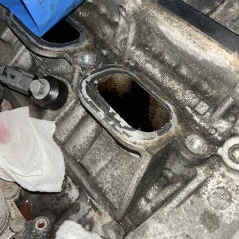 Foggy's Automotive - silicone "quick fixes" instead of doing things the right way. Silicone covering outlets, on coolant Y pipe, & intake manifest - Auto Repair Near Me - Wayne, New Jersey Foggy's Automotive - silicone "quick fixes" instead of doing things the right way. Silicone covering outlets, on coolant Y pipe, & intake manifest - Auto Repair Near Me - Wayne, New Jersey