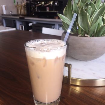 Deeper Roots Coffee - Iced chai tea latte with almond milk - Coffee & Tea Near Me - Cincinnati, Ohio