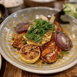Covacha - "Zarandeado" whole striped bass, prepared al pastor style with charred pineapple and onions, beautiful.