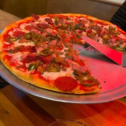 Meat lovers pizza with jalapeño