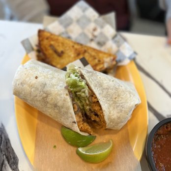 Tia Juana - a burrito with a side of salsa - Tacos Near Me - Grand Rapids, Michigan Tia Juana - a burrito with a side of salsa - Tacos Near Me - Grand Rapids, Michigan