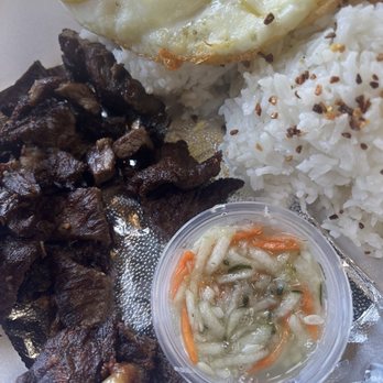 Manila Sunset - Beef tapa (marinated beef) with egg plate - comes with 2 scoops garlic rice and papaya salad/relish - Filipino Near Me - West Covina, California Manila Sunset - Beef tapa (marinated beef) with egg plate - comes with 2 scoops garlic rice and papaya salad/relish - Filipino Near Me - West Covina, California