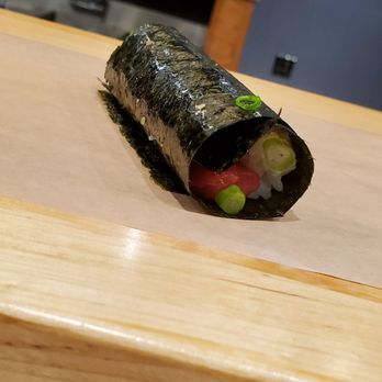 Sugo Hand Roll Bar - One of the "normal rolls". I think this was the salmon ponzu. - Sushi Bars Near Me - Seattle, Washington Sugo Hand Roll Bar - One of the "normal rolls". I think this was the salmon ponzu. - Sushi Bars Near Me - Seattle, Washington