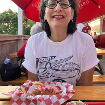 Claws - Happy Tourist with Lobster Roll - Seafood Near Me - Rockland, Maine