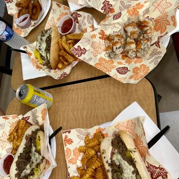 Daniel's Cheesesteak House - Side Hot Ranch $ Small Cheesesteak Side Mom's Honey Garlic BBQ $Small Onion Rings - Cheesesteaks Near Me - Winter Garden, Florida