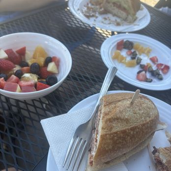 Belle Bakery Cafe - 1/2 Muffuletta and 1/2 Tuna Sandwich and fruit bowl. - Cafes Near Me - Studio City, California