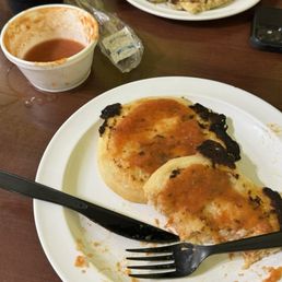 Half-eaten Pupusa plate with: Mixed Pupusa, Chorizo, Bean and Cheese Pupusa, Garlic and Cheese Pupusa Half-eaten Pupusa plate with: Mixed Pupusa, Chorizo, Bean and Cheese Pupusa, Garlic and Cheese Pupusa