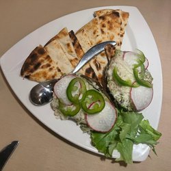 Parea Restaurant - Grilled avocado appetizer with radish and jalapeno slices - very unique and very tasty!