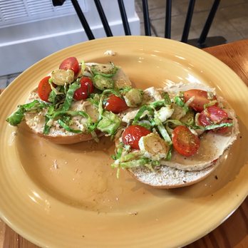 Cherry Coffee Roasters - New Orleans - The veg bagel ( hummus and tomato) - Breakfast & Brunch Near Me - New Orleans, Louisiana Cherry Coffee Roasters - New Orleans - The veg bagel ( hummus and tomato) - Breakfast & Brunch Near Me - New Orleans, Louisiana