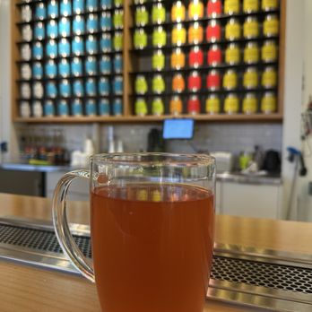 LizzyKate - Freshly brewed tea with all the tea options in the background - Tea Rooms Near Me - Kirkland, Washington