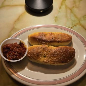 Milano's Pizzeria - Warm fresh bread sticks with marinara sauce - Pizza Near Me - Mesa, Arizona