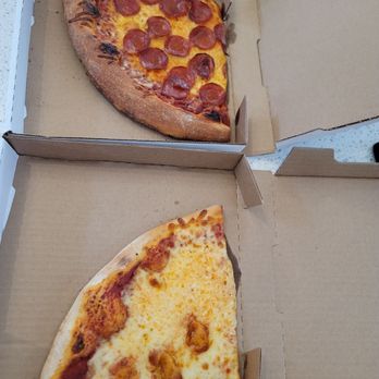 Pizza Window - Pepperoni pizza- overcooked Cheese pizza- fresh and cheesy - Food Stands Near Me - Lake Buena Vista, Florida Pizza Window - Pepperoni pizza- overcooked Cheese pizza- fresh and cheesy - Food Stands Near Me - Lake Buena Vista, Florida