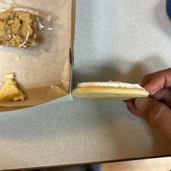 The Bakery House & Catering - Thin sugar cookie compared to the cardboard box.