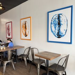 Jacksonville Coffee Company - Seating with cute coffee bean decor