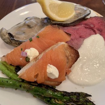 Libra - Asparagus, cream cheese and salmon toast, prime rib and oysters - Breakfast & Brunch Near Me - Orlando, Florida Libra - Asparagus, cream cheese and salmon toast, prime rib and oysters - Breakfast & Brunch Near Me - Orlando, Florida