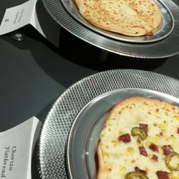 Chorizo flatbread, four cheese and margherita pizza offerings Chorizo flatbread, four cheese and margherita pizza offerings