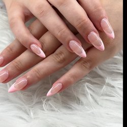 Crystal Nails & Spa - French Tips never go out of style -- they just keep getting prettier A glossy nude base paired with soft pink tips creates the perfect mix