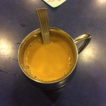 雞記潮州麵食 - Milk coffee in insulated stainless steel mug. As with all good Chinese restaurants tea is better. - Teochew Near Me - Hong Kong, HK
