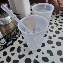 Odd small plastic water cups