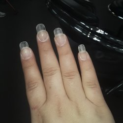 Essence Nails - Dip powder set made of crazy glue directly to my nails in layers and cuticles on fire powder all over and she kept spraying nail dry spray