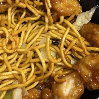 Panda Express - Noddles and orange chicken with a fly . - Chinese Near Me - Chicago, Illinois