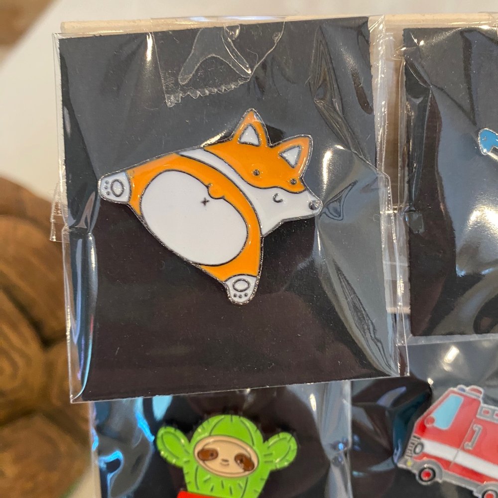 They also sell cute pins :) They also sell cute pins :)