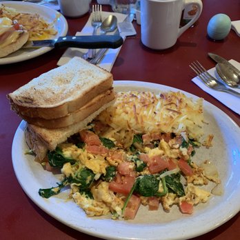 Copper Skillet - Scrambled eggs with onion tomato and spinach with hash browns and sourdough bread - Breakfast & Brunch Near Me - Martinez, California Copper Skillet - Scrambled eggs with onion tomato and spinach with hash browns and sourdough bread - Breakfast & Brunch Near Me - Martinez, California