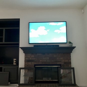 Lange's TV, PC & Sound - Wall mounted tv with concealed wires. - Home Theatre Installation Near Me Lange's TV, PC & Sound - Wall mounted tv with concealed wires. - Home Theatre Installation Near Me