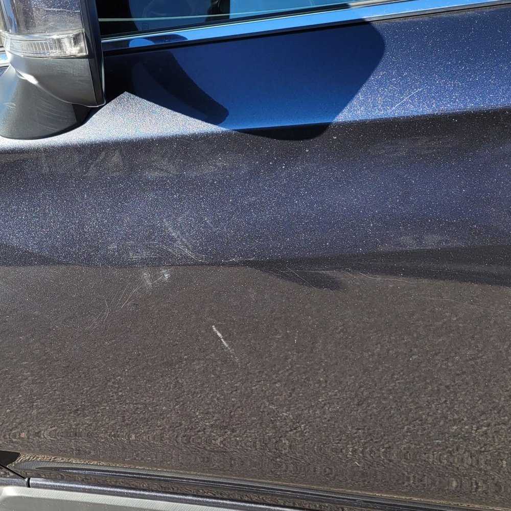 Scratches on the driver side door Scratches on the driver side door