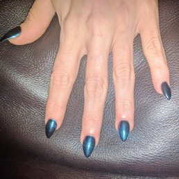 Acrylic extensions, pointy almond shape, blue iridescent metallic powder done by Taylor Acrylic extensions, pointy almond shape, blue iridescent metallic powder done by Taylor