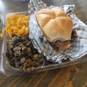 Medium pit beef sandwich platter with mac & cheese and collard green.