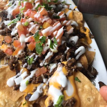Costa Grande - Meat Nachos - Carne Asada with everything :-p yummy!!! - Mexican Near Me - Van Nuys, California Costa Grande - Meat Nachos - Carne Asada with everything :-p yummy!!! - Mexican Near Me - Van Nuys, California