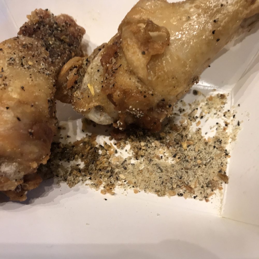 Buffalo Wild Wings - Lemon pepper wings with all the seasoning at the bottom. - Chicken Wings Near Me - Douglasville, Georgia