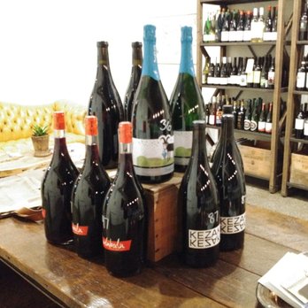 Wine Shoppe - bottles of wine on a table - Beer, Wine & Spirits Near Me - Waco, Texas