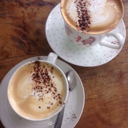 Two cappuccinos Two cappuccinos