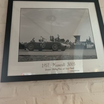 Chicanes Restaurant & Bar - a framed photograph of a racing car - Bars Near Me - Sebring, Florida