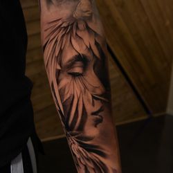 Mor Ink Tattoo - Beautiful portrait of a girl with flowers