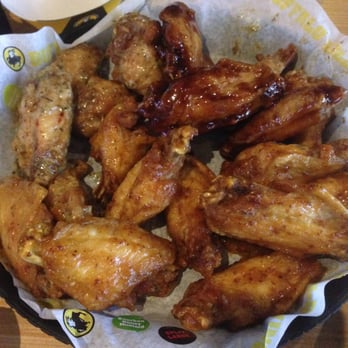 Buffalo Wild Wings - 3 kinds of wings served on a plate: Garlic Parmesan, Bourbon Honey Mustard, and Mild Buffalo. - American Near Me - Tucson, Arizona Buffalo Wild Wings - 3 kinds of wings served on a plate: Garlic Parmesan, Bourbon Honey Mustard, and Mild Buffalo. - American Near Me - Tucson, Arizona