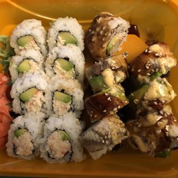 a close up of a plate of sushi a close up of a plate of sushi