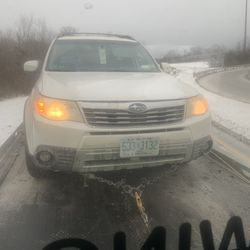 Ernie's Towing - The flat bed truck with our car, "Olaf."