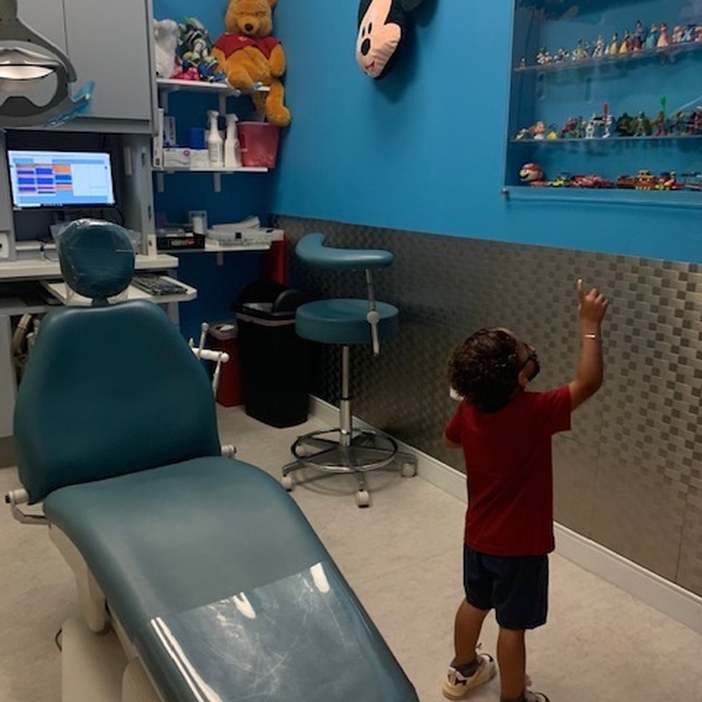 Private room at Kingstown Pediatric Dentistry - Fun toy collection and Disney murals on the walls.