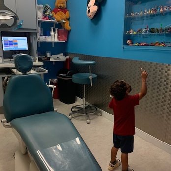 Kingstowne Pediatric Dentistry - Private room at Kingstown Pediatric Dentistry - Fun toy collection and Disney murals on the walls. - Pediatric Dentists Near Me - Alexandria, Virginia