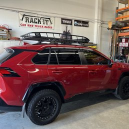 Thule canyon xt roof basket with extension on a 2021 Toyota RAV4 prime.
