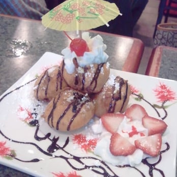 LD Pho - Fried oreo cookies coated dough, drizzled w/ chocolate syrups, icing on top & strawberry slices, then decorated w/ Japanese umbrella ...yum - Vietnamese Near Me - Chicago, Illinois LD Pho - Fried oreo cookies coated dough, drizzled w/ chocolate syrups, icing on top & strawberry slices, then decorated w/ Japanese umbrella ...yum - Vietnamese Near Me - Chicago, Illinois