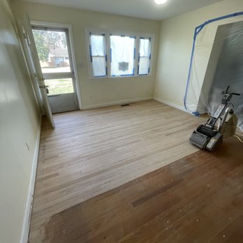 Jim's Home Improvements - a hardwood floor being painted - General Contractors Near Me - Elizabeth City, North Carolina Jim's Home Improvements - a hardwood floor being painted - General Contractors Near Me - Elizabeth City, North Carolina