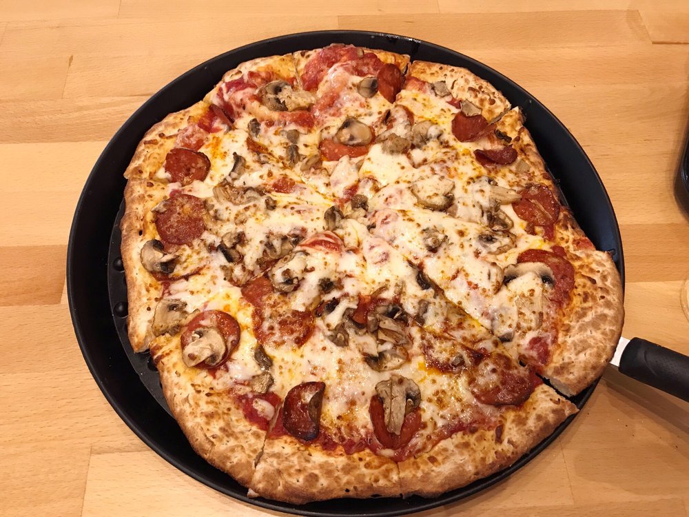 Noble Romen's Pizza Logo