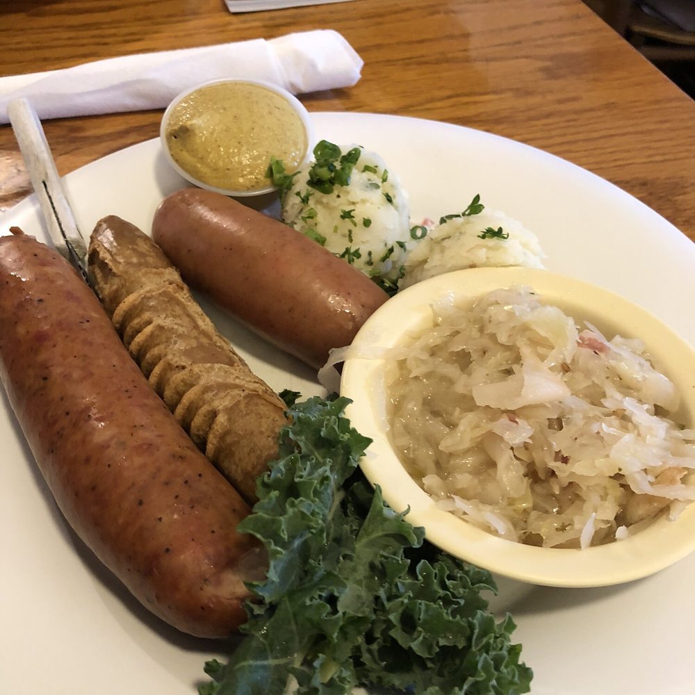 Der Lindenbaum - 3 kinda of brats platter - German Near Me - Fredericksburg, Texas Der Lindenbaum - 3 kinda of brats platter - German Near Me - Fredericksburg, Texas